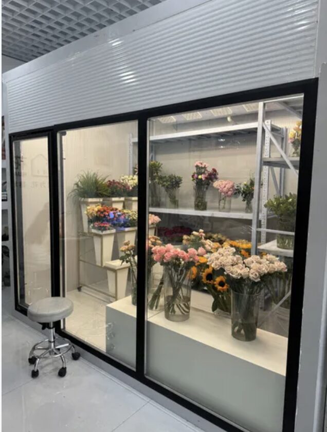 Floor to ceiling glass flower cold room